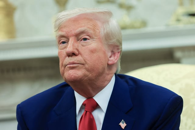 U.S. President Donald Trump looks on during a meeting with Israeli Prime Minister Benjamin Netanyahu (not pictured) in the Oval Office at the White House in Washington, U.S., April 7, 2025. REUTERS/Kevin Mohatt