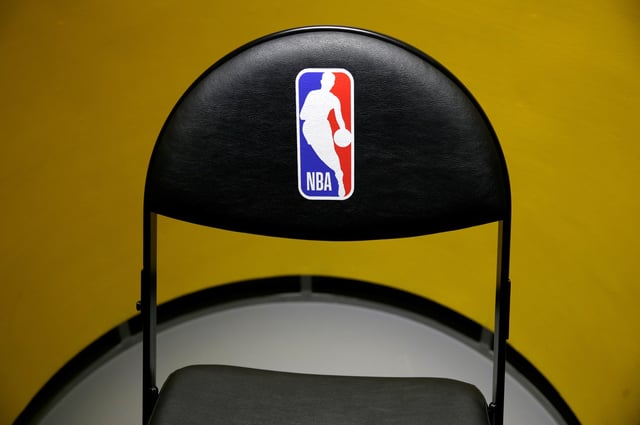 An NBA logo is seen on a chair at an NBA exhibition in Beijing, China October 8, 2019. REUTERS/Jason Lee