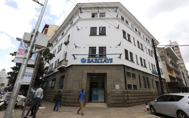 A man walks past the Barclays bank market branch along Muindi Mbingu street in Kenya's capital Nairobi, March 1, 2016. REUTERS/Thomas Mukoya/File Photo