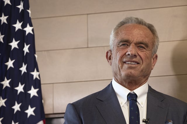 Health and Human Services Secretary Robert F. Kennedy Jr. looks on during a press conference about Utah's new fluoride ban, food additives and SNAP funds legislation, Monday, April 7, 2025, in Salt Lake City. (AP Photo/Melissa Majchrzak)