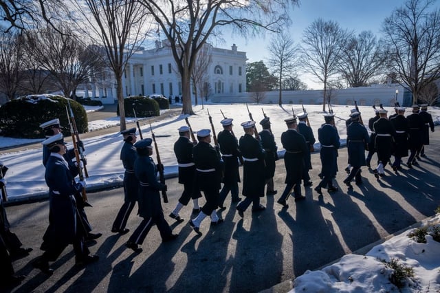 Members of the U.S. military Joint Honor Guard parade as they rehearse ahead of the upcoming presidential inauguration at the North Lawn in front of the White House in January. (AP file/Ben Curtis)