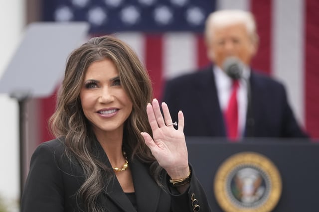 Homeland Security Secretary Kristi Noem is recognized as President Donald Trump speaks during an event to announce new tariffs in the Rose Garden at the White House, Wednesday, April 2, 2025, in Washington. (AP Photo/Mark Schiefelbein)