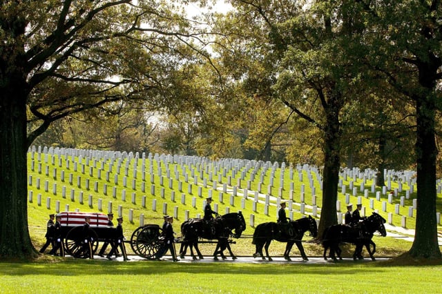 FILE - A U.S. Army Caisson team carries the remains of Army Pfc. Tramaine J. Billingsley during burial services at Arlington National Cemetery in Arlington, Va., Nov. 2, 2010. (AP Photo/Kevin Wolf, File)