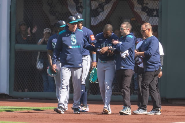 Apr 6, 2025; San Francisco, California, USA; Seattle Mariners right fielder Victor Robles (10) is injured during the play against the San Francisco Giants during the ninth inning attended medical personal at Oracle Park. Mandatory Credit: Neville E. Guard-Imagn Images/File Photo