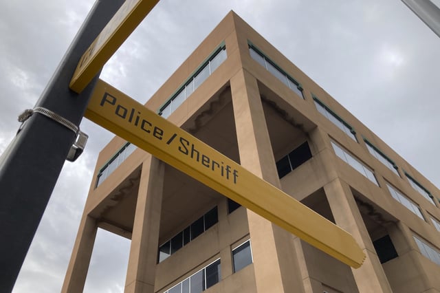 Signage is posted outside police headquarters Monday, Sept. 11, 2023, in downtown Albuquerque, N.M. (AP Photo/Susan Montoya Bryan, File)