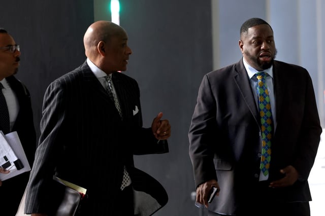 State Sen. Emil Jones III, right, arrives at the Dirksen U.S. Courthouse for the jury selection on his bribery trial on April 7, 2025. (Antonio Perez/Chicago Tribune)
