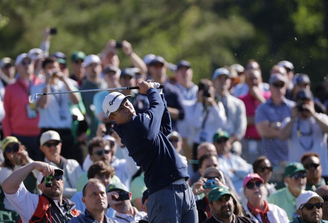 Golf - The Masters - Augusta National Golf Club, Augusta, Georgia, U.S. - April 8, 2025 Collin Morikawa of the U.S. hits his tee shot on the 12th hole during a practice round REUTERS/Brian Snyder