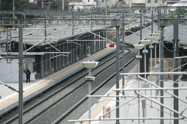 Security patrol at the Greek capital's shuttered main railway station during a nationwide 24-hour strike, as labor unions press for a full return of collective bargaining rights that were scrapped during successive international bailouts more than a decade ago, in Athens, Greece, on Wednesday, April 9, 2025. (AP Photo/Thanassis Stavrakis)