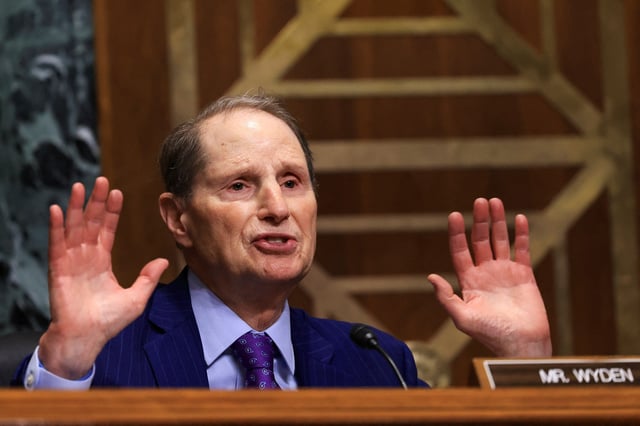 U.S. Senator Ron Wyden (D-OR) speaks, as U.S. Trade Representative Jamieson Greer testifies before a Senate Finance Committee hearing on U.S. President Donald Trump's trade policy, on Capitol Hill in Washington, D.C., U.S., April 8, 2025. REUTERS/Kevin Mohatt/File Photo