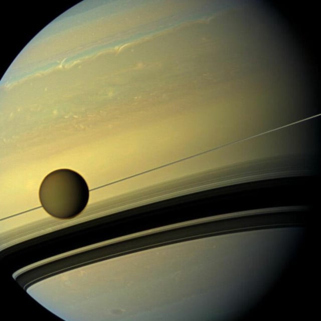 Titan, the largest moon of Saturn, has the ingredients for life, but scientists aren't sure what the chances are that it's inhabited.