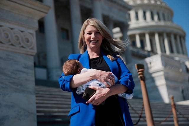 U.S. Rep. Brittany Pettersen (D-CO) holds her one-month old baby Sam as she departs during a series of votes at the Capitol on March 11, 2025 in Washington, DC.  The House passed a bill to avert a Friday government shutdown by a 217-213 vote largely along party lines. The bill now moves to the Senate where it will need help from Democrats to move it past a filibuster. Pettersen is currently working to pass legislation to allow proxy voting for up to 12 weeks for members who have recently given birth or whose spouse has. (Photo by Anna Moneymaker/Getty Images)