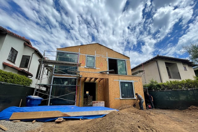 A house under construction is seen in Los Angeles, California, U.S., June 22, 2022. REUTERS/Lucy Nicholson/File Photo
