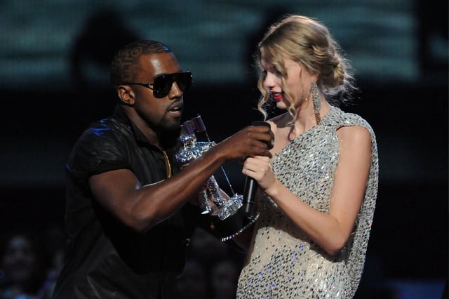 Kanye West jumps on stage after Taylor Swift won the &#34;Best Female Video&#34; award during the 2009 MTV Video Music Awards at Radio City Music Hall on September 13, 2009 in New York City.