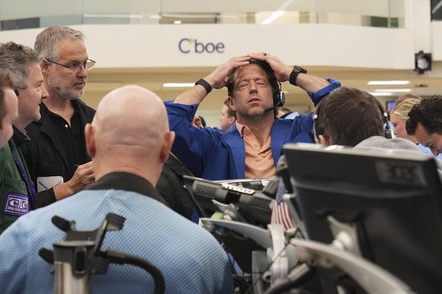 Traders on the floor at the Cboe Global Markets in Chicago