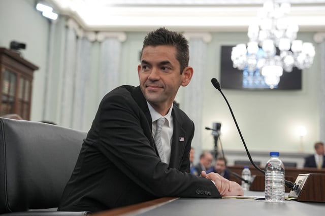 Jared Isaacman, U.S. President Donald Trump's nominee to be administrator of the National Aeronautics and Space Administration (NASA), reacts before testifying during a Senate Commerce, Science, and Transportation confirmation hearing on Capitol Hill in Washington, D.C., U.S., April 9, 2025. REUTERS/Ken Cedeno