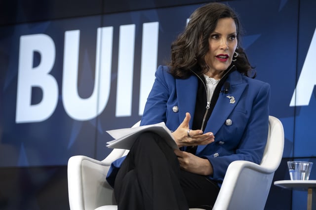 Michigan Gov. Gretchen Whitmer speaks with former television journalist Gretchen Carlson, not shown, at an event on Wednesday, April 9, 2025, in Washington. (AP Photo/Mark Schiefelbein)