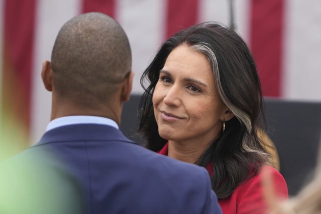 Director of National Intelligence Tulsi Gabbard arrives before President Donald Trump speaks during an event to announce new tariffs in the Rose Garden at the White House, Wednesday, April 2, 2025, in Washington. (AP Photo/Mark Schiefelbein)