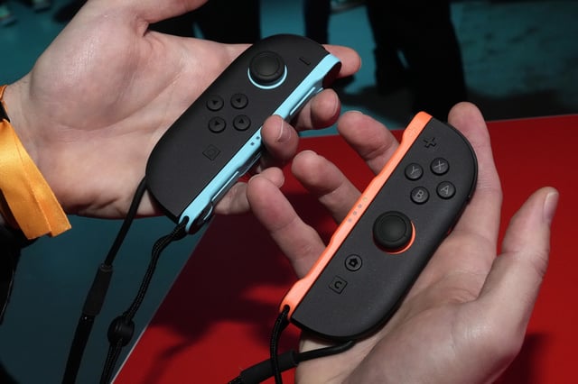 The Joy-Con controllers of the Nintendo Switch 2 that include a new "C" button, are shown during a media event, in New York, Wednesday, April 2, 2025. (AP Photo/Richard Drew)