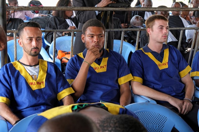 Benjamin Zalman Polun, Marcel Malanga and Tyler Thompson, American citizens suspected along with a group of around fifty other people to be involved in an attempted coup in Congo, wait for the final verdict during their trial in Kinshasa, Democratic Republic of Congo, September 13, 2024. REUTERS/Justin Makangara /File Photo