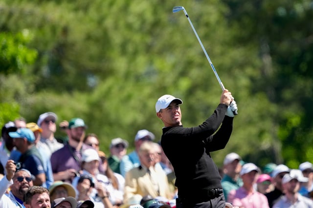 Rory McIlroy tees off on No. 12 during a practice round of the Masters Tournament at Augusta National Golf Club.