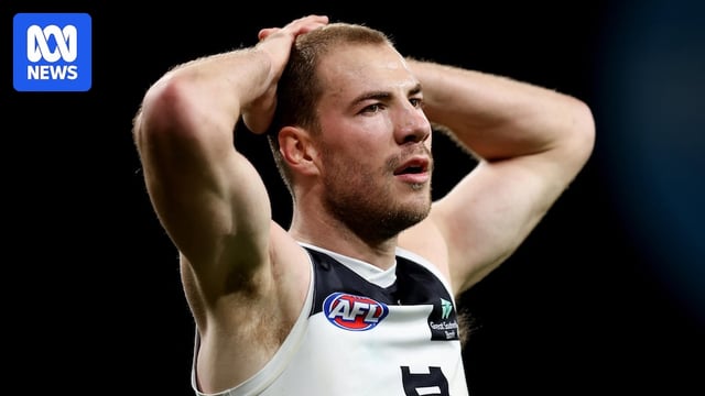 Harry McKay holds his hands on his head