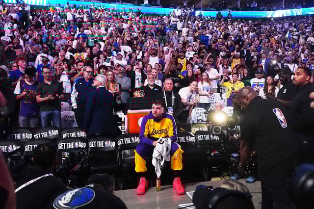 Los Angeles Lakers' Luka Dončić watches a tribute video before playing in his first game in Dallas since being traded.