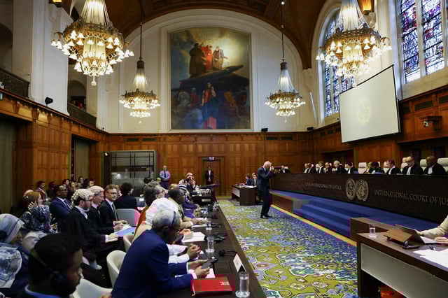 Delegates attend a hearing at the International Court of Justice for a case brought by Sudan to the World Court demanding emergency measures against the UAE and accusing the Gulf state of violating obligations under the Genocide Convention by arming paramilitary forces, in The Hague, Netherlands, April 10, 2025. REUTERS/Piroschka van de Wouw