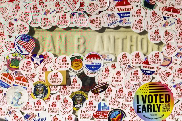 The headstone of Susan B. Anthony covered in &#34;I voted&#34; stickers at Mount Hope Cemetery in Rochester, N.Y., Tuesday, Nov. 5, 2024.