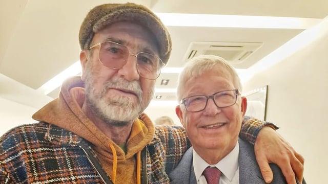 Cantona spent time with Ferguson, right, before the Manchester derby. The Frenchman has criticsed the club’s co-owner, who has made 450 people redundant as part of cost-cutting measures