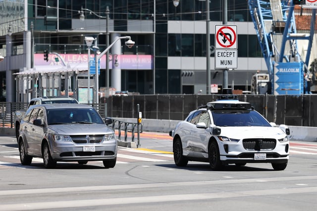 A Waymo driverless car drives through the intersection of Van Ness Avenue and Market streets, in San Francisco on Tuesday, August 8, 2023. The intersection was among those with the highest number of crashes, according to our readers’ list of “most hated” intersections.