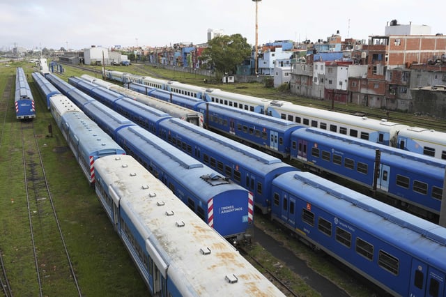 Trains stand still at the Retiro train station due to a general strike against the austerity measures of President Javier Milei in Buenos Aires, Argentina, Thursday, April 10, 2025. (AP Photo/Rodrigo Abd)