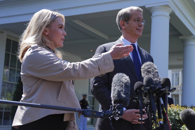Treasury Secretary Scott Bessent and White House press secretary Karoline Leavitt speak with reporters outside the West Wing of the White House, Wednesday, April 9, 2025, in Washington. (AP Photo/Evan Vucci)
