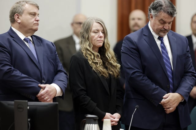 FILE - Lori Vallow Daybell stands and listens as the jury's verdict is read at the Ada County Courthouse in Boise, Idaho on Friday, May 12, 2023. Vallow Daybell faces up to life in prison without parole when she is expected to be sentenced Monday, July 31, in the murders of her two youngest children and a romantic rival. (AP Photo/Kyle Green, File)