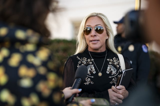 Rep. Marjorie Taylor Greene (R-Ga.) speaks to reporters while arriving at the Capitol Hill Club for a meeting of the House Republican Conference on March 25, 2025 in Washington, DC.