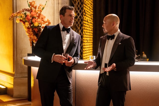 Jon Hamm (left as Andrew Cooper) has a sobering talk about his finances with his business manager Barney Choi (Hoon Lee) in Apple TV+'s "Your Friends & Neighbors."