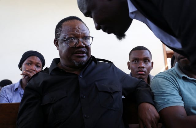 Tanzanian opposition leader and former presidential candidate of CHADEMA party Tundu Lissu talks to his lawyer Jebra Kambole at the Kisutu Resident Magistrate's Court in Dar es Salaam, Tanzania April 10, 2025. REUTERS/Emmanuel Herman