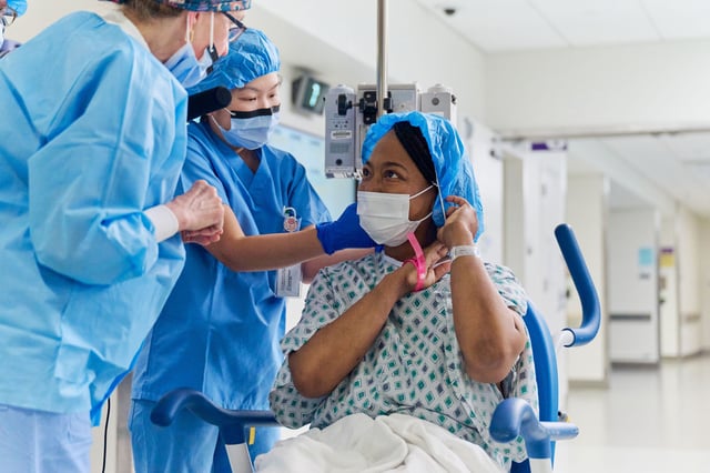 Towana Looney is brought into the operating room for her xenotransplant surgery at NYU Langone Health in New York City on November 25, 2024. Photo by Joe Carrotta for NYU Langone Health.