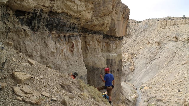 A paleontologist is seen here prospecting for dinosaur fossils in North American Cretaceous rocks. The study's findings suggested that less rock from the late Cretaceous is exposed on Earth's surface, which may cloud the picture on dinosaur diversity during that window of time.