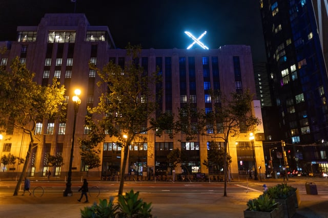 'X' logo is seen on the top of the headquarters of the messaging platform X, formerly known as Twitter, in downtown San Francisco, California, U.S., July 30, 2023. REUTERS/Carlos Barria/File Photo