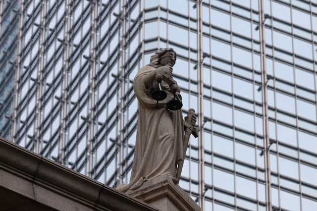 A statue of Lady Justice at the Court of Final Appeal is pictured, in Hong Kong, China, September 5, 2023. REUTERS/Tyrone Siu/File Photo