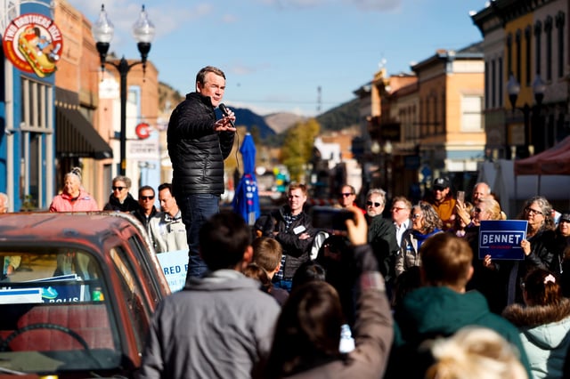 In this October 2022 photo, Sen. Michael Bennet speaks to a crowd of supporters in Idaho Springs, Colorado.