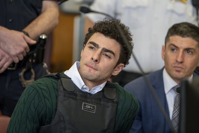 Luigi Mangione, accused of fatally shooting the UnitedHealthcare CEO Brian Thompson in New York City and leading authorities on a five-day search, appears in court for a hearing, Friday, Feb. 21, 2025, in New York.