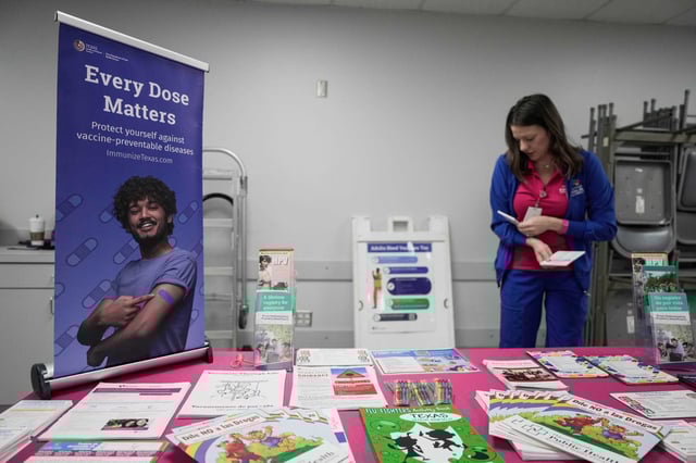 An information booth for measles vaccinations offered by Harris County Public Health is photographed on Saturday, April 5, 2025 in Houston. The measles outbreak centered in the South Plains region of Texas grew to 541 cases across the state on Friday, according to health officials.