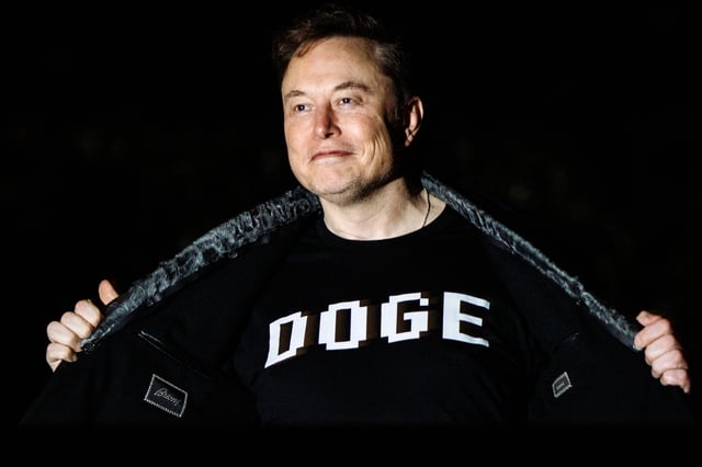 White House Senior Advisor Elon Musk walks to the White House after landing in Marine One on the South Lawn with U.S.
