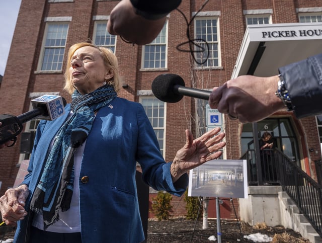 Maine Gov. Janet Mills speaks to the press Wednesday after a dedication of the Picker House Lofts in the Continental Mill in Lewiston.