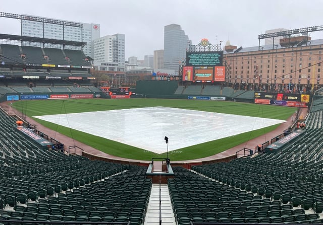 April 3, 2024: Orioles vs. Royals baseball game at Camden Yards is delayed because of rain. (Kenneth K. Lam/Staff)