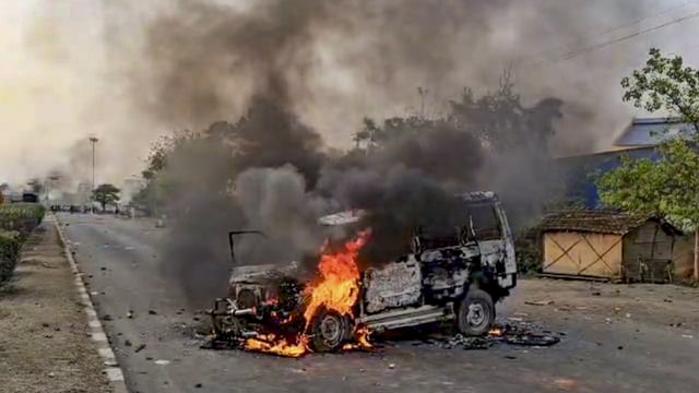 A torched vehicle during a protest against Waqf (Amendment) Act, in Murshidabad district, Friday, April 11, 2025. 