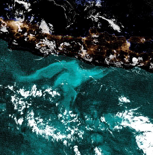 The larger "milky seas" can be seen from space, as shown in this colorized satellite image of an event.