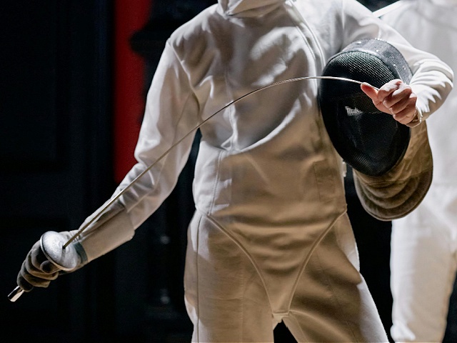 A Fencer in Full Fencing Gear