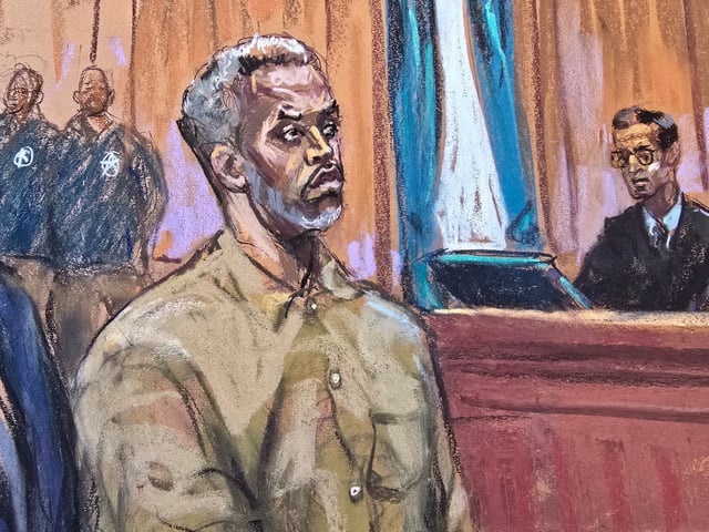 Sean "Diddy" Combs stands as he is arraigned on a superseding indictment ahead of his May trial on sex trafficking charges, in New York, U.S., March 14, 2025, in this courtroom sketch. REUTERS/Jane Rosenberg?